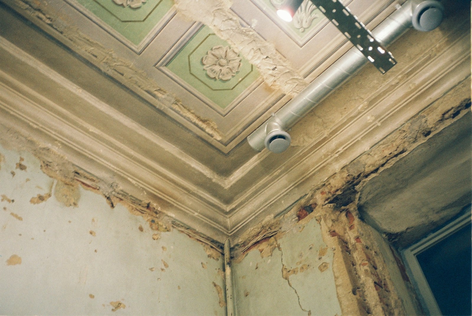 Ceiling with peeling paint from moisture